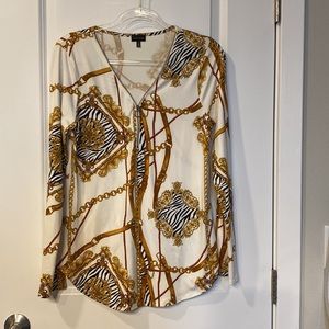 Buckle Long/rolled sleeve sassy chain and zebra print zip top. New condition